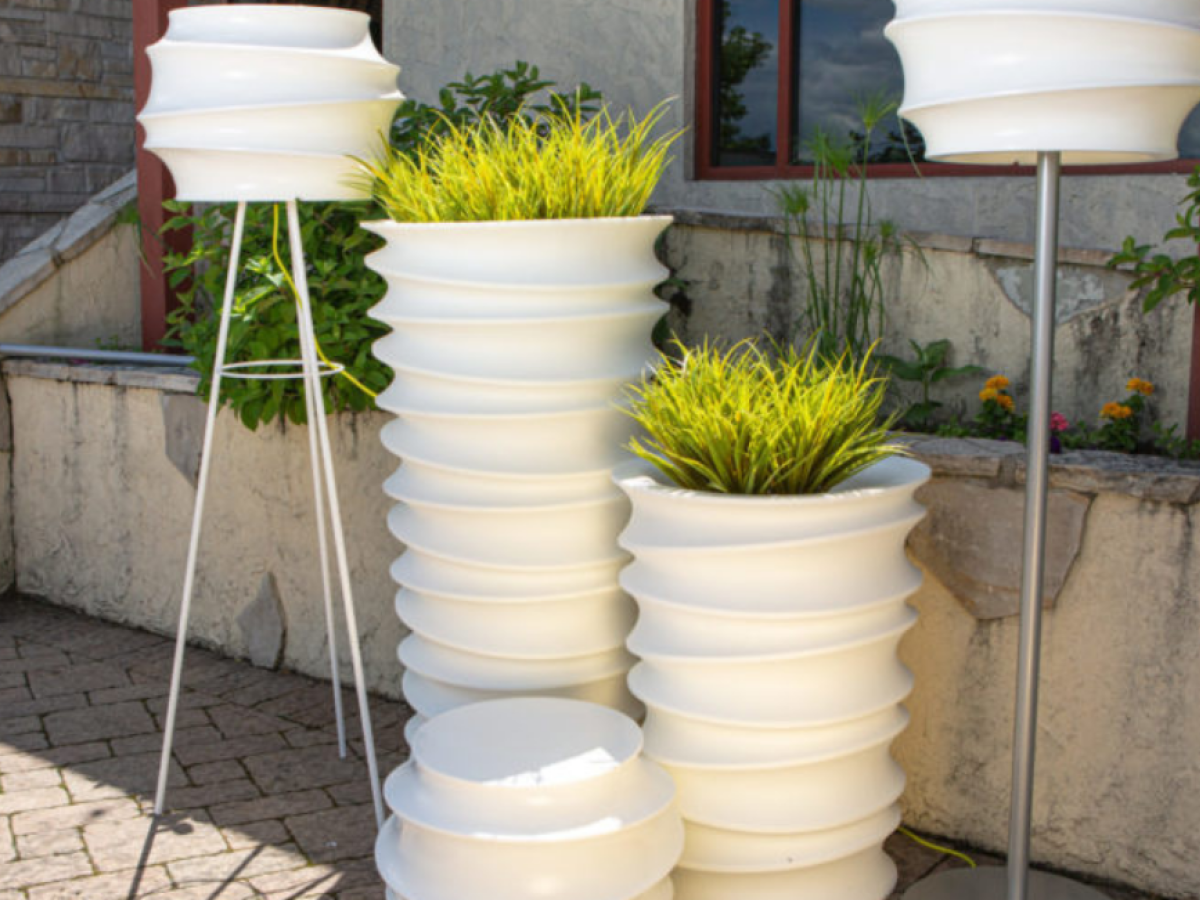 modern hospitality white planters outdoor